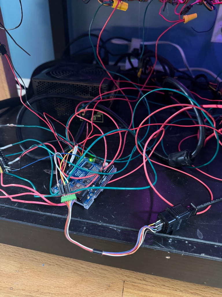 Arduino Uno R4 WiFi board wired into the LED game table